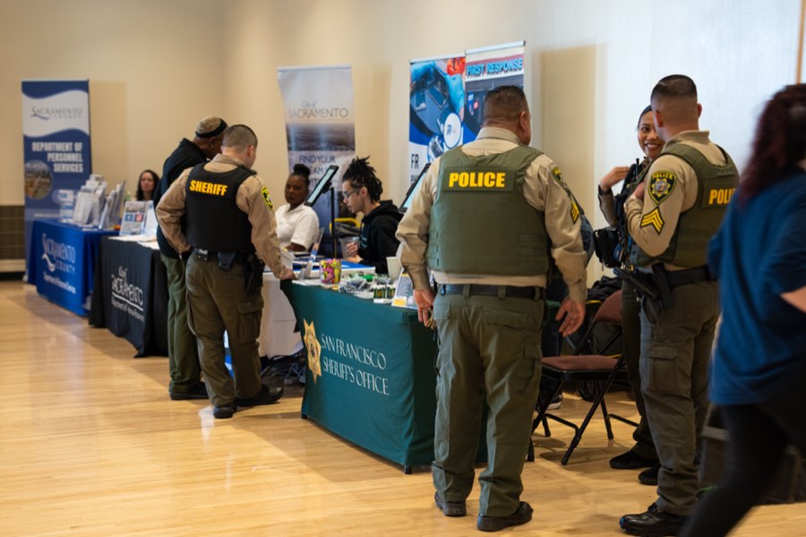 Public safety recruiters meeting candidates